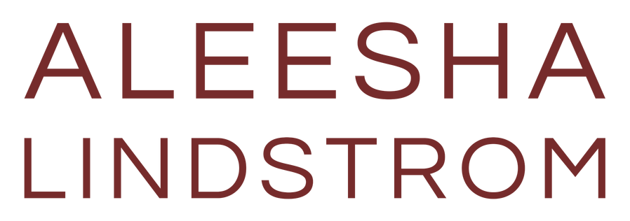 Aleesha Lindstrom - Logo A maroon text logo with the name of Aleesha Lindstrom against a plain, white background.